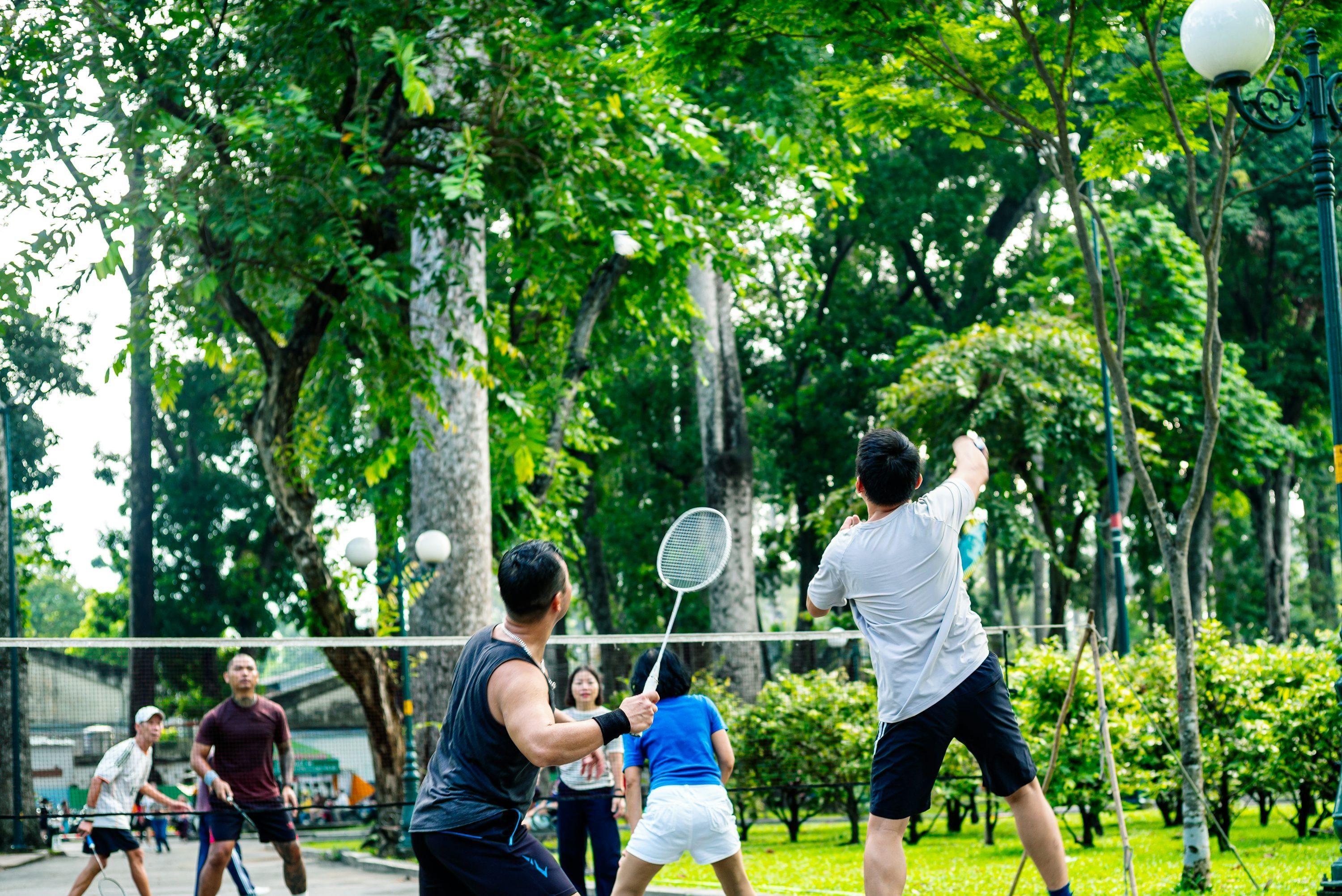Friends enjoying badminton together